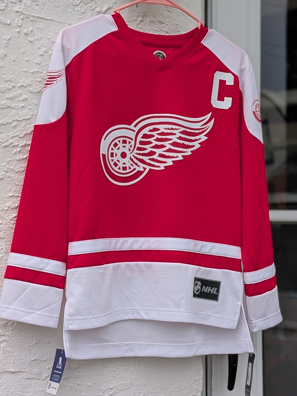 NHL Red and White Kids Hockey Jersey - Captain size L 12-14